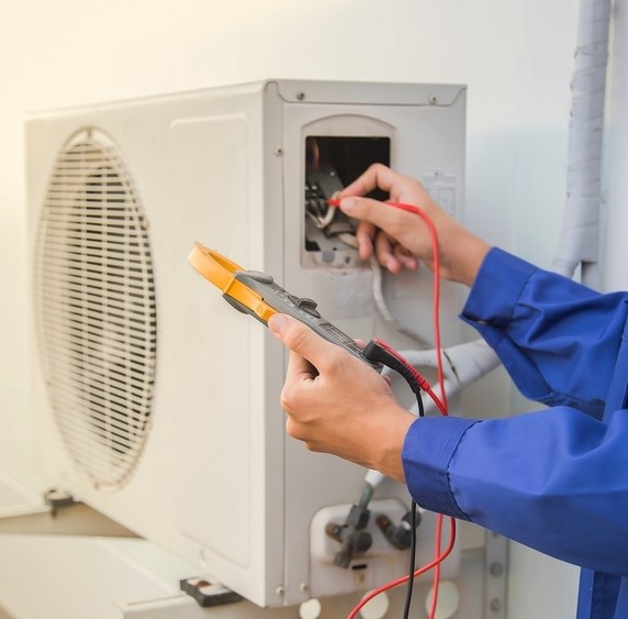 Ac Technician Checking Air Conditioning System