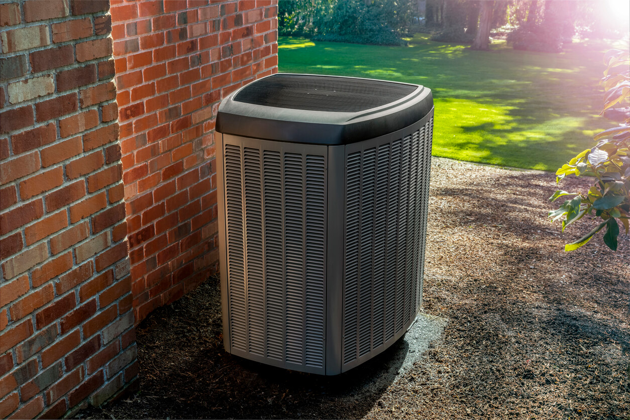 Environmentally Friendly Heat Pump Located In The Back Yard 